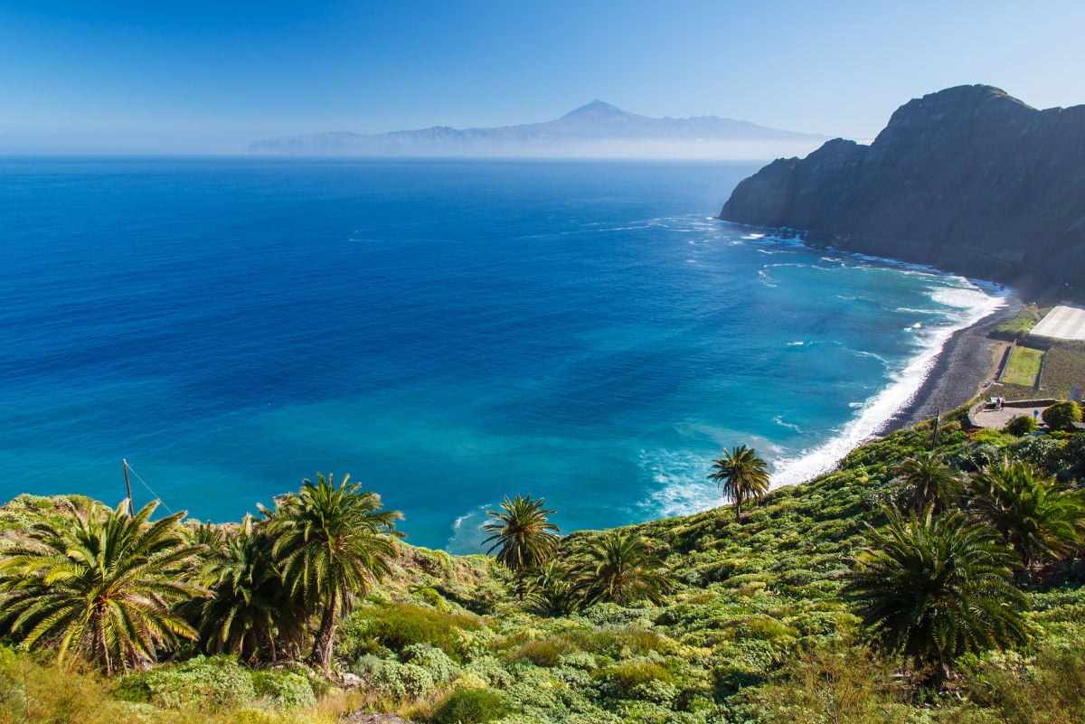 Blue water on black sand beach in La Gomera