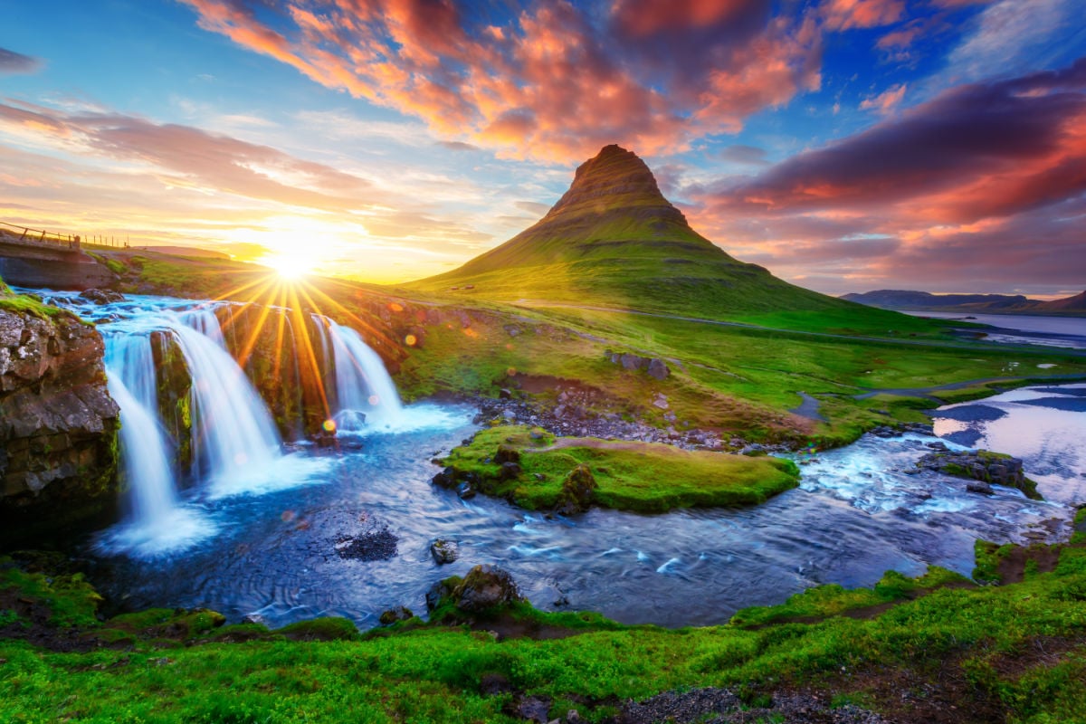 Gorgeous landscape with rising sun on Kirkjufellsfoss waterfall
